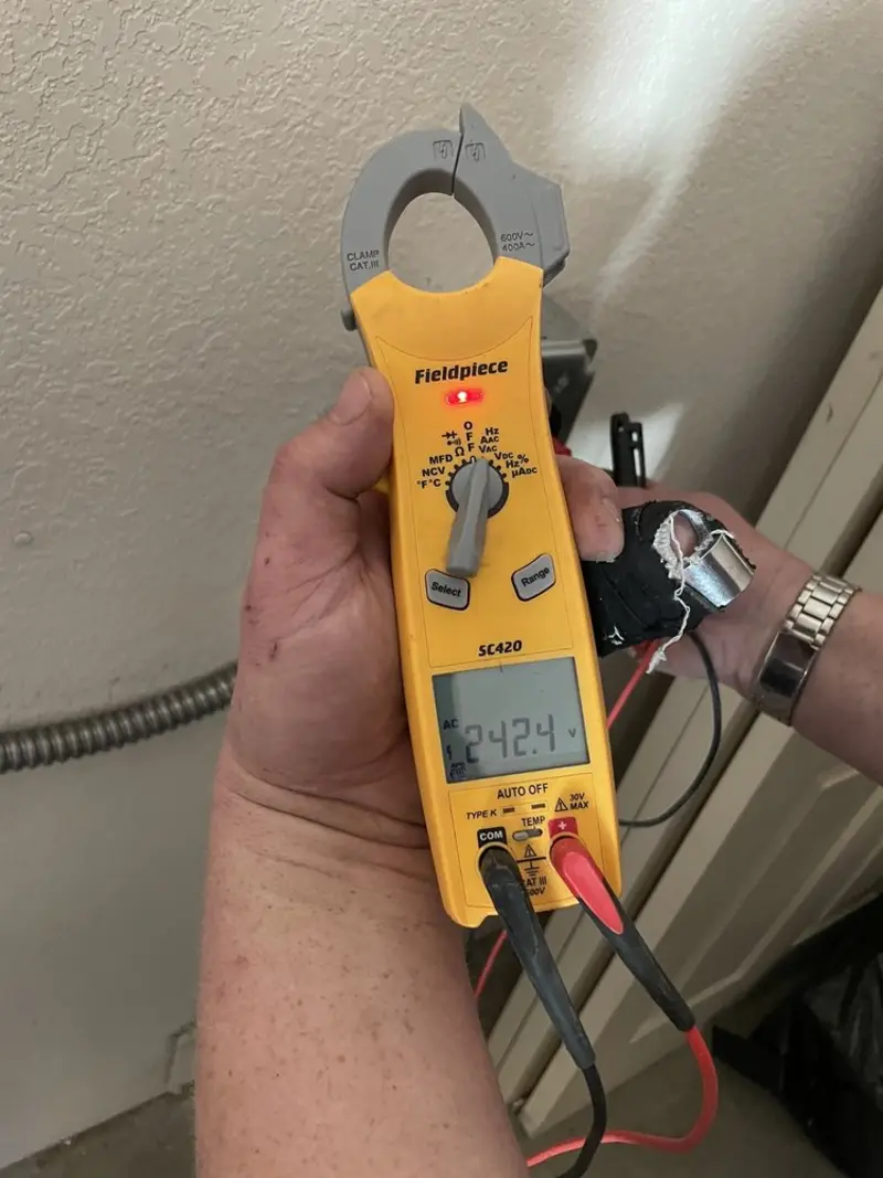 Voltage testing with clamp meter during Electrical Installation Services in Portsmouth